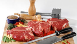 Porthouse Steaks on Cutting Board
