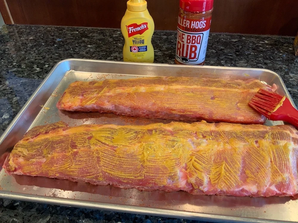 Brush Yellow Mustard On Baby Back Ribs