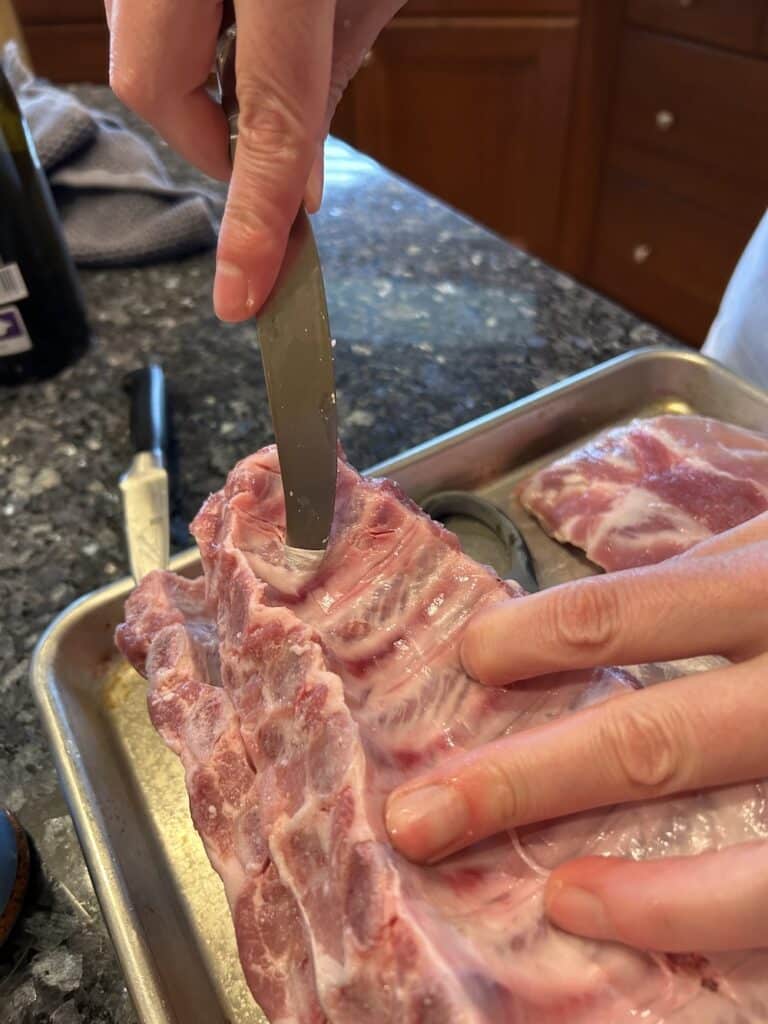 Coax membrane off rack with a dinner knife